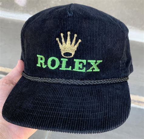 rolex hats and shirts.